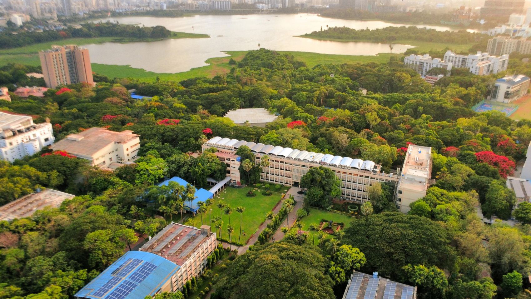 Aerial view of the IIT Bombay campus; the white building at the extreme left is the CSE Department